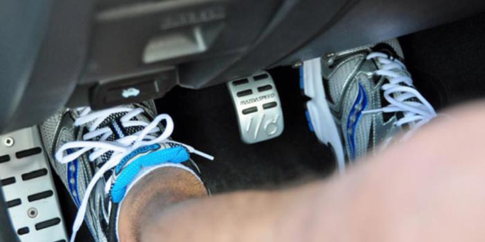Resting your foot on the clutch pedal